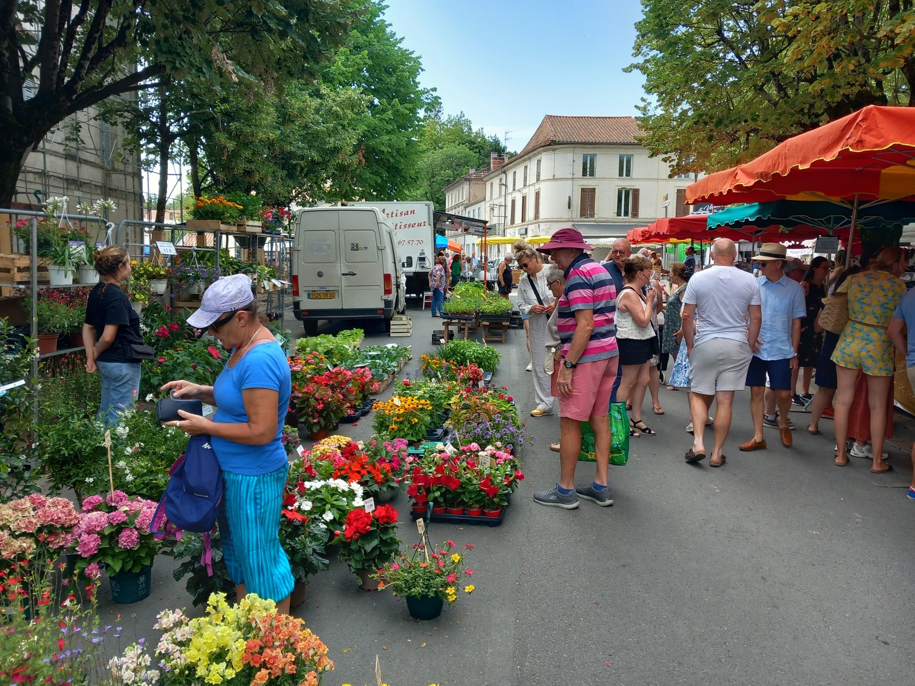 Market stalls and local life in Villamblard Dordogne